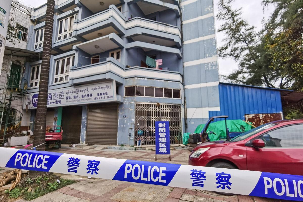 Police tape blocks access to a building as part of COVID-19 measures in the city of Ruili in China’s southwestern Yunnan Province on July 5, 2021. (STR/AFP via Getty Images)