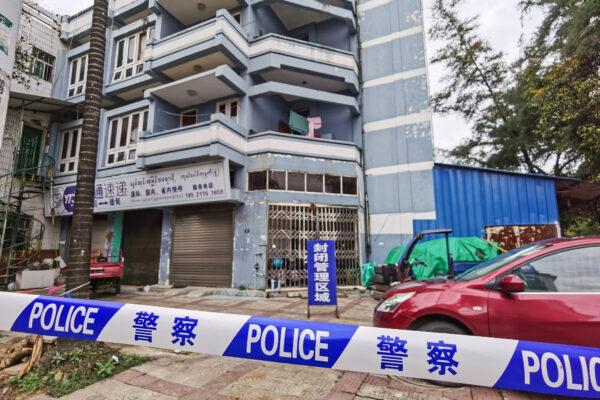 Police tape blocks access to a building as part of COV ID-19 measures in the city of Ruili in China’s southwestern Yunnan Province on July 5, 2021. (STR/AFP via Getty Images)