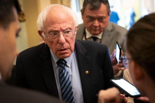Sen. Bernie Sanders (I-Vt.) speaks to reporters after a lunch with President Joe Biden and Senate Democrats at the U.S. Capitol in Washington, on July 14, 2021. (Drew Angerer/Getty Images)