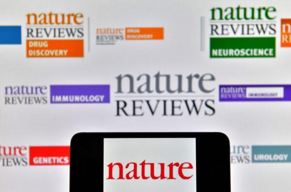 Lgos of multidisciplinary scientific journal Nature displayed on computers' screens in a file photo. (Loic Venance/AFP via Getty Images)