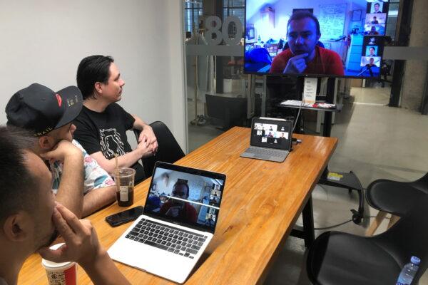 Hax's engineers discuss a prototype with the team from Unicorn Bio over a video call amid the COVID-19 pandemic, from their office at Huaqiangbei electronics market in Shenzhen, Guangdong province, China, on July 16, 2021. (David Kirton/Reuters)