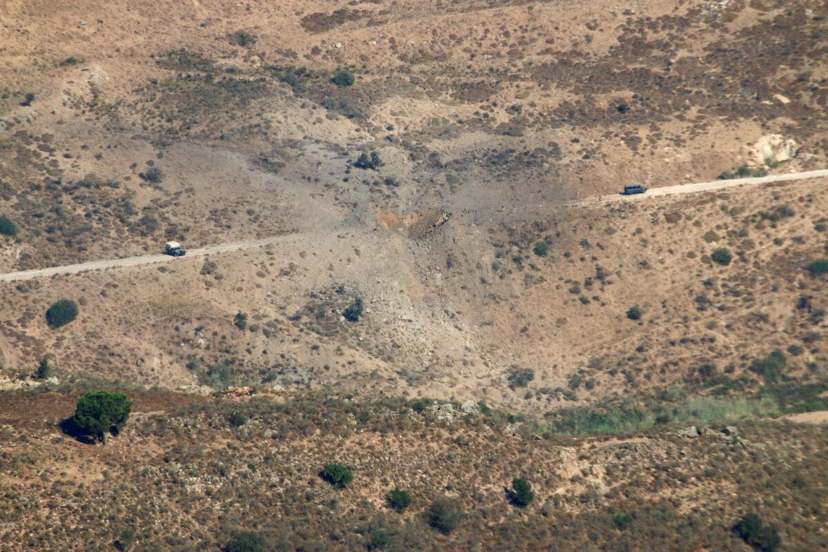 A view shows the damage in the aftermath of Israeli air strikes as seen from Marjayoun, near the border with Israel, Lebanon, on Aug. 5, 2021. (Karamallah Daher/Reuters)