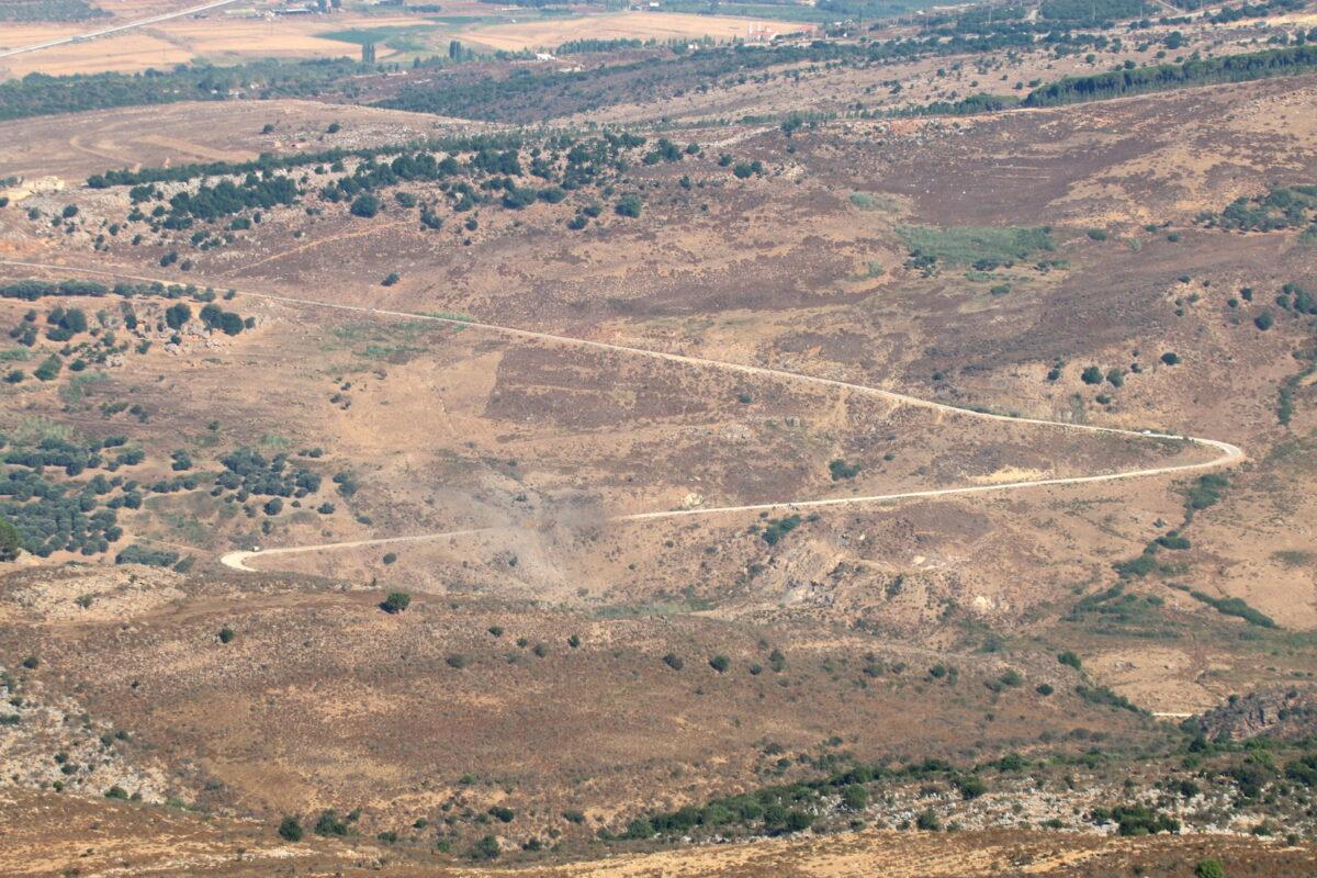 A view shows the damage in the aftermath of Israeli airstrikes as seen from Marjayoun, Lebanon, near the border with Israel, on Aug. 5, 2021. (Karamallah Daher/Reuters)
