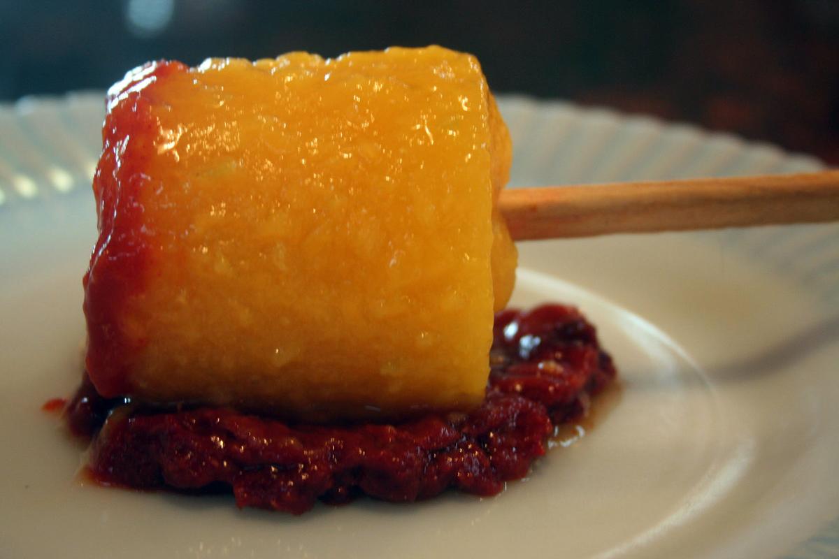 There are many ways to serve a mangoneada; this one invovles a mango popsicle that you dip into a well of chamoy. (Ari LeVaux)
