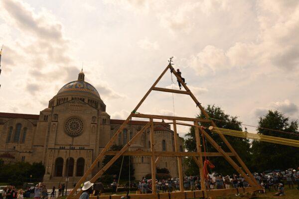Raising the Notre Dame Cathedral roof truss replica in front of the Basilica of the National Shrine of the Immaculate Conception in Washington, D.C., on Aug. 3, 2021. (Patrick G. Ryan/Catholic University of America)