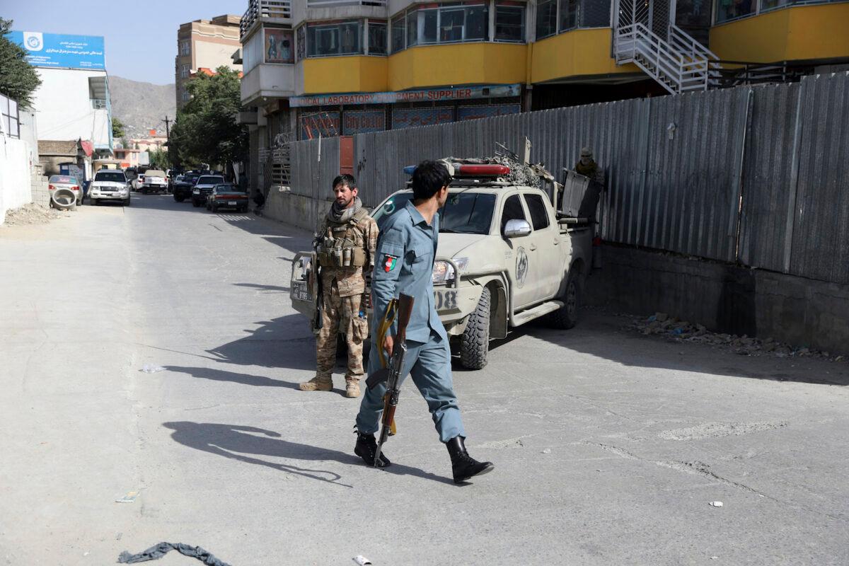 Afghan security personnel arrives at the area where the director of Afghanistan's Government Information Media Center Dawa Khan Menapal was shot dead in Kabul, Afghanistan on Aug. 6, 2021. (Rahmat Gul/AP Photo)