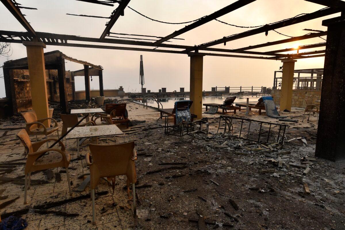A burnt hotel during a wildfire in Lalas village, near Olympia town, western Greece on Aug. 5, 2021. (Giannis Spyrounis/ilialive.gr via AP)