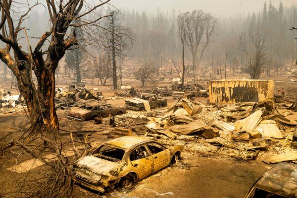 This photo shows cars and homes destroyed by the Dixie Fire line in central Greenville in Plumas County, Calif., on Aug. 5, 2021. (Noah Berger/AP Photo)