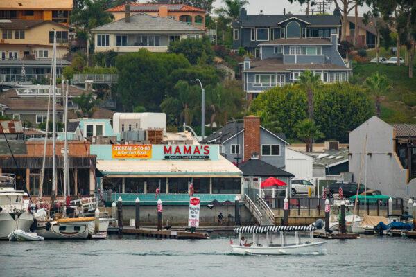 A view of a portion of the Mariner's Mile from the Newport Beach Harbor, in Newport Beach, Calif., on Aug. 8, 2020. (John Fredricks/The Epoch Times)