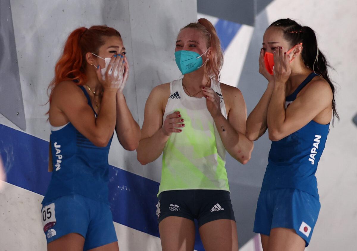 (L-R) Miho Nonaka of Team Japan, Janja Garnbret of Team Slovenia, and Akiyo Noguchi of Team Japan celebrate during the Sport Climbing Women's Combined Final on day fourteen of the Tokyo 2020 Olympic Games at Aomi Urban Sports Park in Tokyo, Japan on Aug. 6, 2021. (Maja Hitij/Getty Images)