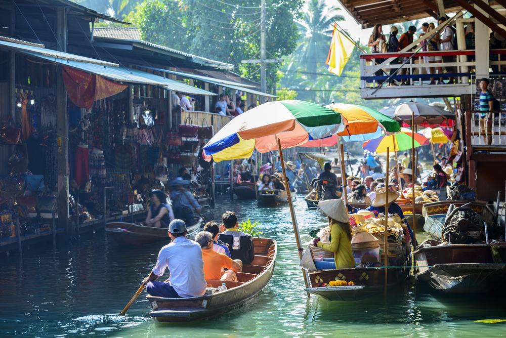 The Damnoen Saduak Floating Market is about 60 miles southwest of Bangkok. (aphotostory/Shutterstock)