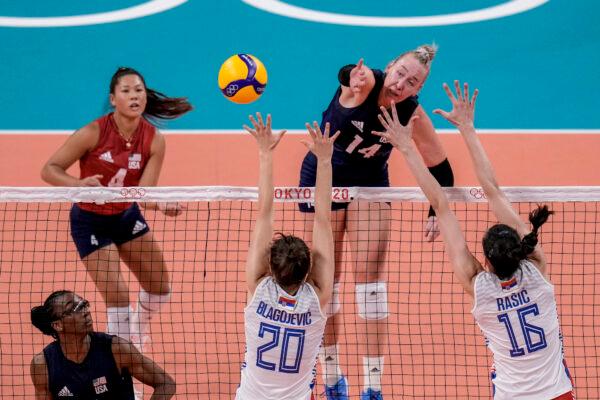 United States' Michelle Bartsch-Hackley spikes the ball during the women's volleyball semifinal match between Serbia and United States at the 2020 Summer Olympics in Tokyo, Japan, on Aug. 6, 2021. (Manu Fernandez/AP Photo)