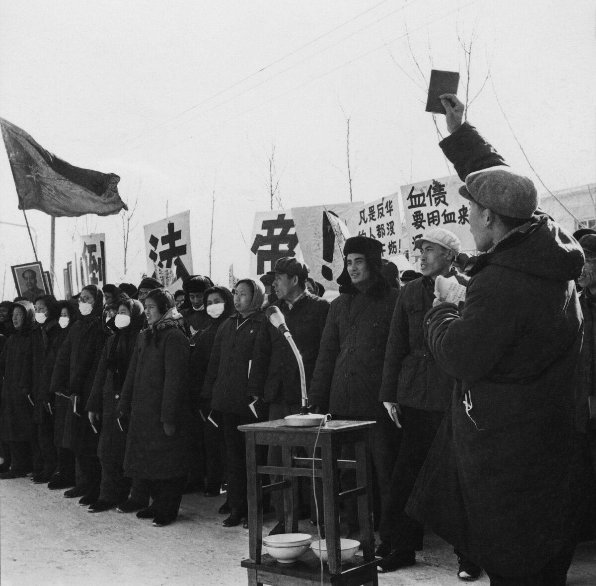 Chinese people demonstrate during the "great proletarian Cultural Revolution" in front of the French embassy in Beijing on January 1967. Protesters show symbols of the Revolution such as the portrait of Mao Zedong, banners, and the book "Quotations from Chairman Mao Tse-tung." Since the cultural revolution was launched in May 1966 at Beijing University, Mao's aim was to recapture power after the failure of the "Great Leap Forward." The movement was directed against those "Party leaders in authority taking the capitalist road." (Jean Vincent/AFP via Getty Images)