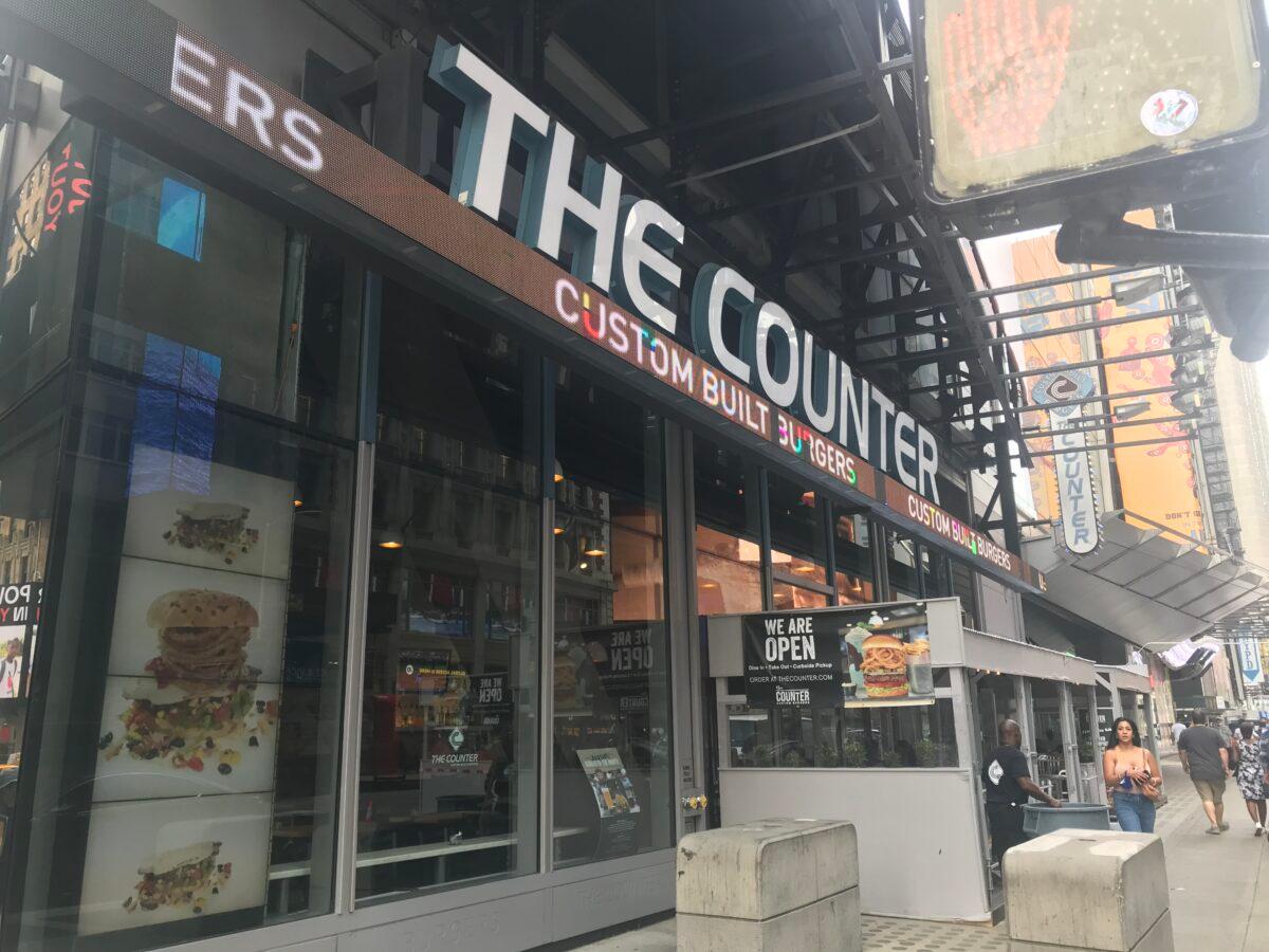 "The Counter" custom burger shop in Times Square, N.Y., on Aug. 7, 2021. (Enrico Trigoso/The Epoch Times)