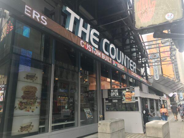 "The Counter" custom burger shop in Times Square, New York, on Aug. 7, 2021. (Enrico Trigoso/The Epoch Times)