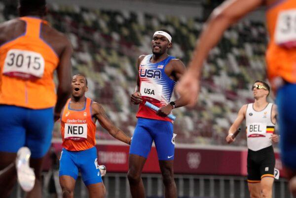 Rai Benjamin, of the United States, anchors his team to the gold medal in the final of the men's 4 x 400-meter relay at the 2020 Summer Olympics, in Tokyo, Japan, on Aug. 7, 2021. (Charlie Riedel/AP Photo)