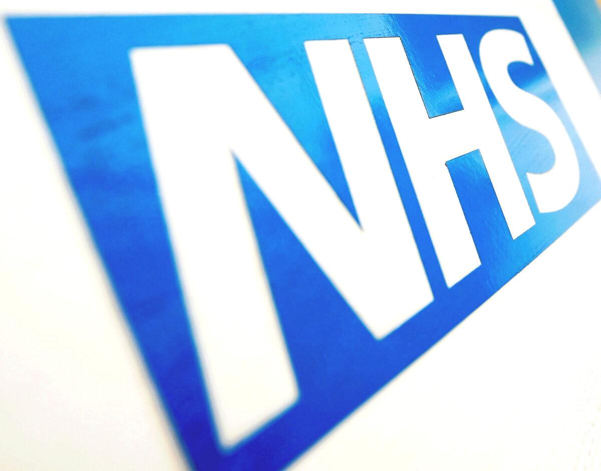  A photo of an NHS logo taken on Nov. 6, 2010. (Dominic Lipinski/PA)