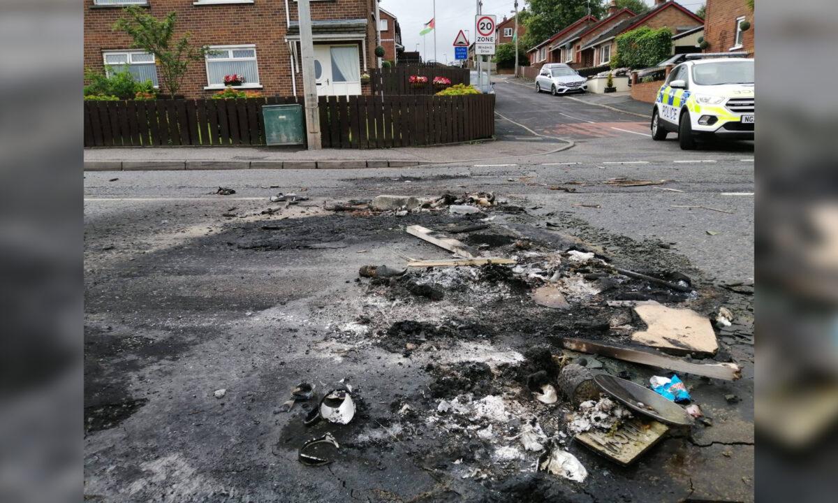 Damage caused after a gang of up to 30 people, including masked men, threw masonry and petrol bombs during a night of disorder in Co. Tyrone, Northern Ireland, on Aug. 7, 2021. (Police Service Northern Ireland/Handout via PA)