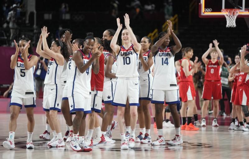 Team USA celebrates winning the gold medal against Japan in the women's basketball gold medal match during the Tokyo 2020 Olympic Summer Games at Saitama Super Arena in Saitama, Japan, on Aug. 8, 2021. (James Lang/USA TODAY Sports via Reuters)