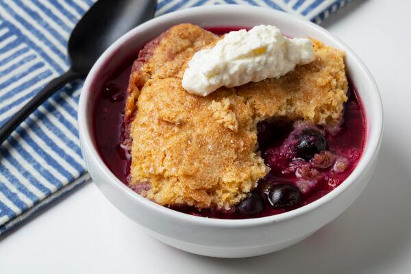 Mixed berry cobbler with mascarpone and lemon cream from JeanMarie Brownson, styled by Shannon Kinsella, on June 29, 2021. (E. Jason Wambsgans/Chicago Tribune/TNS)