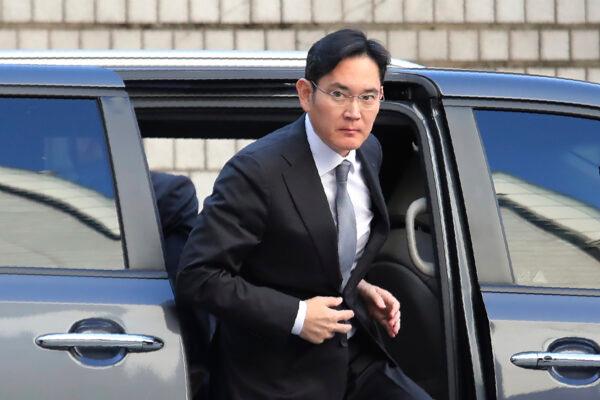 Samsung Electronics Vice Chairman Lee Jae-yong gets out of a car at the Seoul High Court in Seoul, South Korea, on Nov. 22, 2019. (Ahn Young-joon/AP Photo)