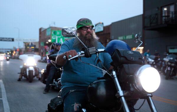 Motorcycles cruised through downtown Sturgis, S.D., on Aug. 5, 2021. (Stephen Groves/AP Photo)