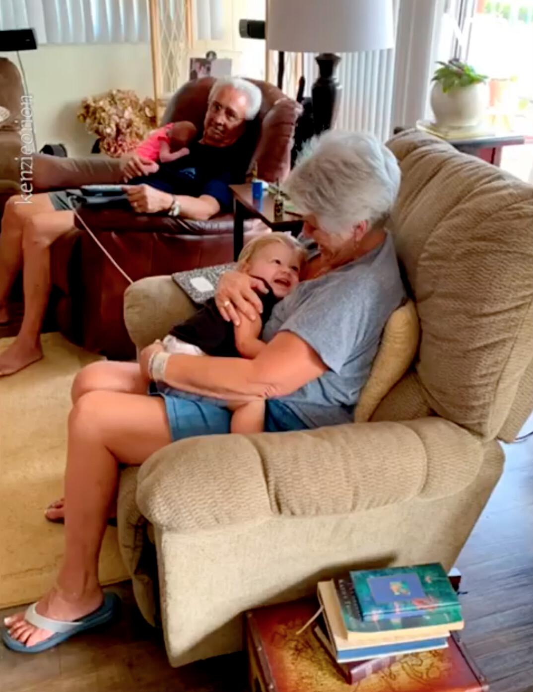 Liz and Charlie cuddling Mackenzie and Kyle's babies, James and Rory. (Courtesy of <a href="https://www.instagram.com/kenzieorion/">Mackenzie Orion Harrison</a>)
