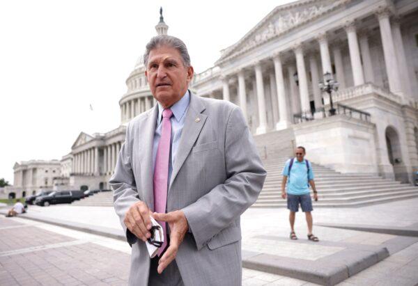 Sen. Joe Manchin (D-W.Va.) leaves the U.S. Capitol following a vote in Washington, on Aug. 3, 2021. (Kevin Dietsch/Getty Images)
