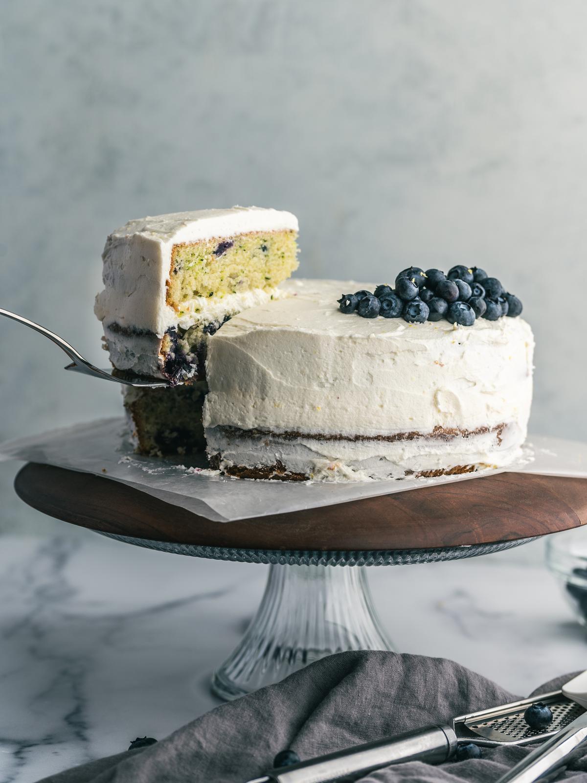 Made tender with zucchini and applesauce, studded with blackberries and blueberries, and finished with lemon buttercream, this is essentially a fruit and vegetable medley in delicious cake form. (Matt Genders Photography)