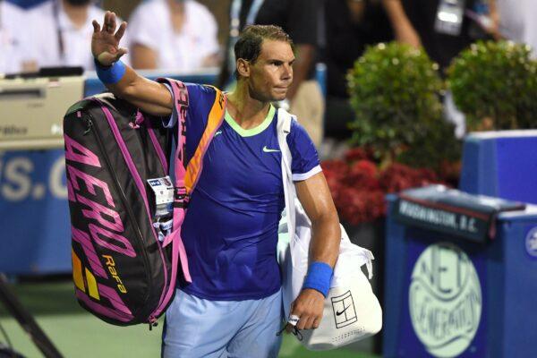 Rafael Nadal of Spain waves to the crowd after losing a match to Lloyd Harris of South Africa on Day 6 during the Citi Open at Rock Creek Tennis Center in Washington, on Aug. 5, 2021. (Mitchell Layton/Getty Images)