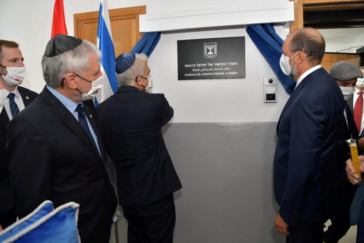 Israeli Foreign Minister Yair Lapid inaugurates Israel's diplomatic mission, in the presence of Minister Delegate to the Moroccan Foreign Ministry Mohcine Jazouli, in Rabat, Morocco, on Aug. 12, 2021. (Israel Ministry of Foreign Affairs/Handout via Reuters)