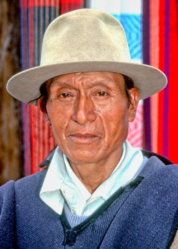 An Otavaleño Indian man at the great Indian market in Otavalo. (Copyright Fred J. Eckert)