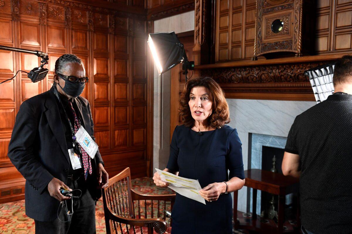 New York Lt. Governor Kathy Hochul speaks with a news crew before taking part in a remote interview on NBC's TODAY with Savannah Guthrie from her office at the state Capitol in Albany, N.Y., on Aug. 12, 2021. (Hans Pennink/AP Photo)