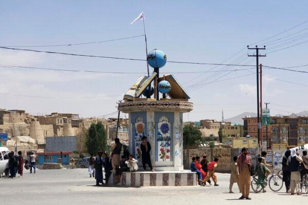 A Taliban flag flies at a square in the city of Ghazni, Afghanistan, on Aug. 12, 2021. (Gulabuddin Amiri/AP Photo)