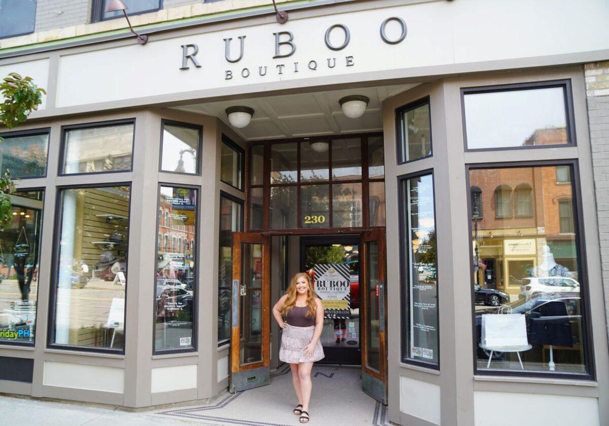 Demiree Fultz stands in front of her ladies fashion boutique in downtown Port Huron, Michigan, oo August 11, 2021. (Steven Kovac/Epoch Times)