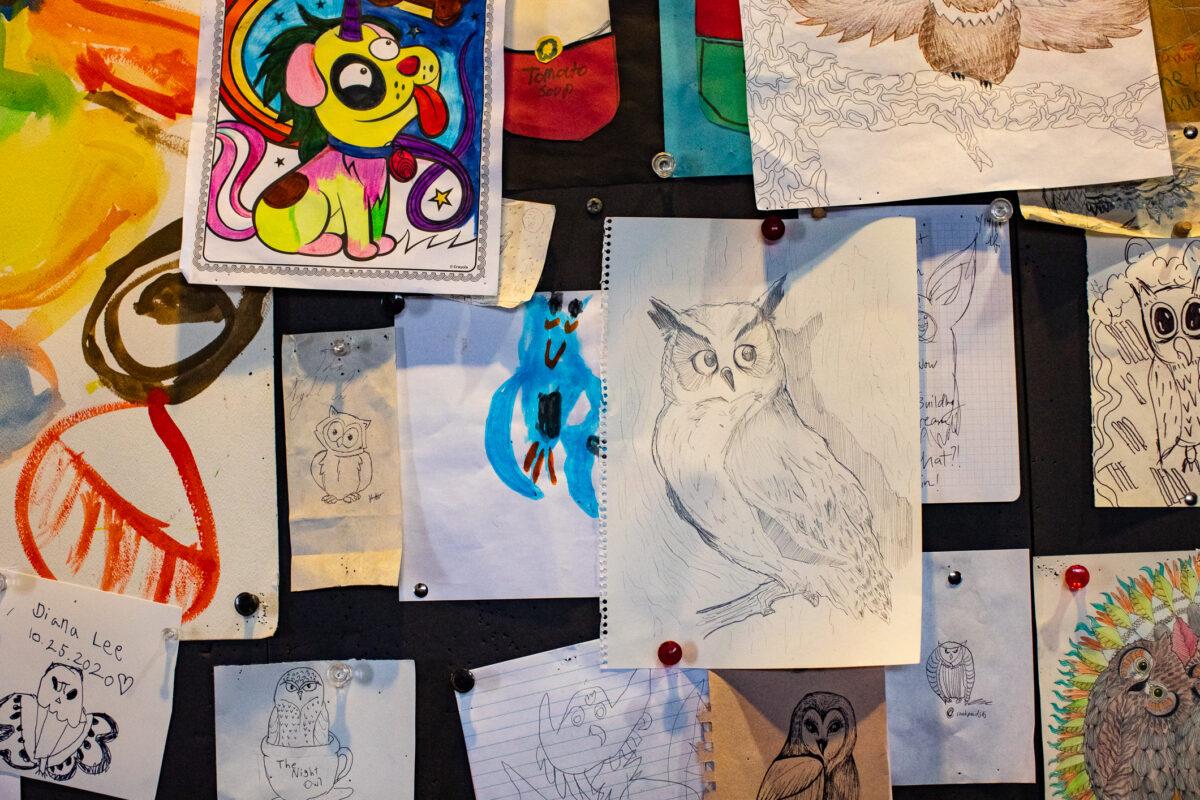 Customers leave their artwork on the walls of The Night Owl coffee shop in Fullerton, Calif., on Aug. 12, 2021. (John Fredricks/The Epoch Times)