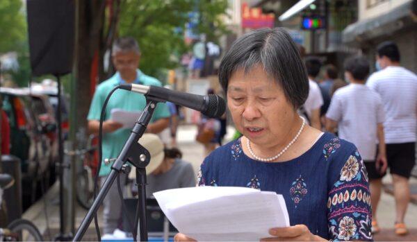Mrs. Hui Zhen, former Chinese middle school principal, shared the tragic experience of herself and her family in Communist China at the rally. (William Huang/The Epoch Times)