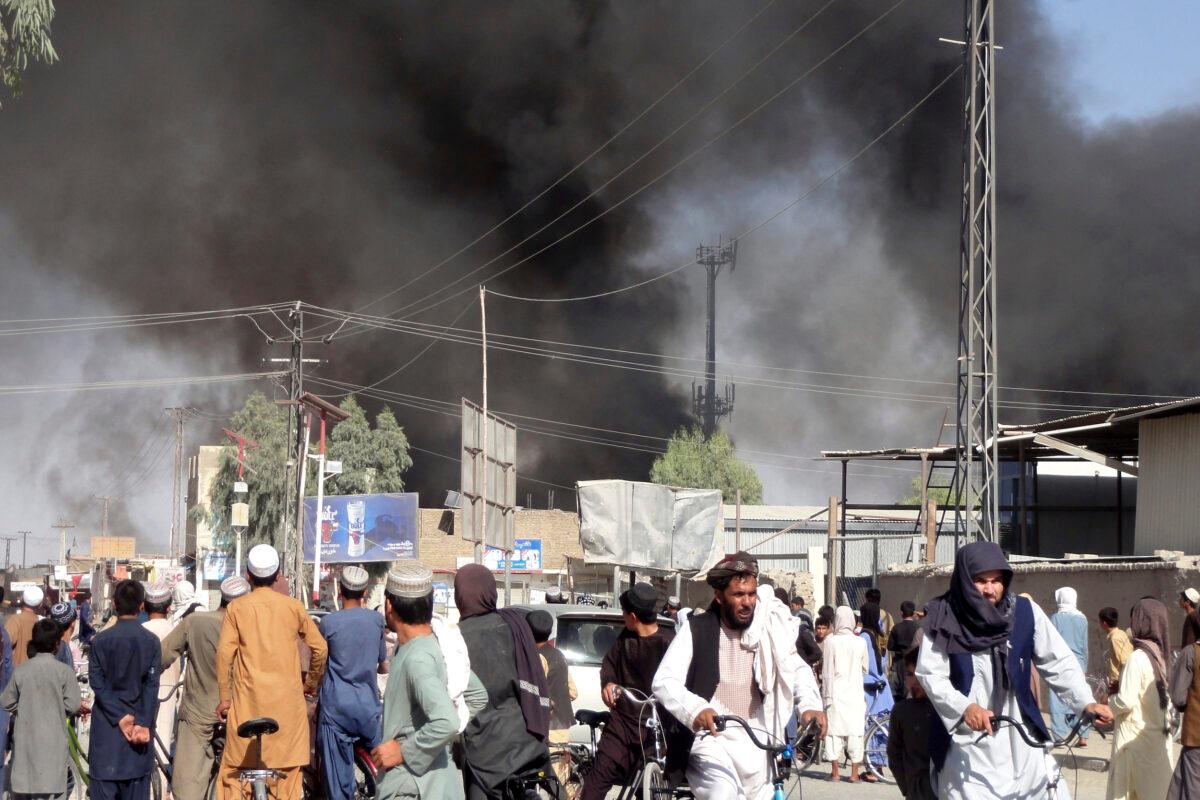 Smoke rises after fighting between the Taliban and Afghan security personnel in the city of Kandahar province south of Kabul, Afghanistan, on Aug. 12, 2021. (Sidiqullah Khan/AP Photo)