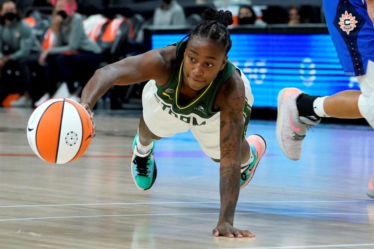Seattle Storm guard Jewell Loyd passes the ball during the first half against the Connecticut Sun in the Commissioner's Cup WNBA basketball game, in Phoenix, on Aug. 12, 2021. (Matt York/AP Photo)