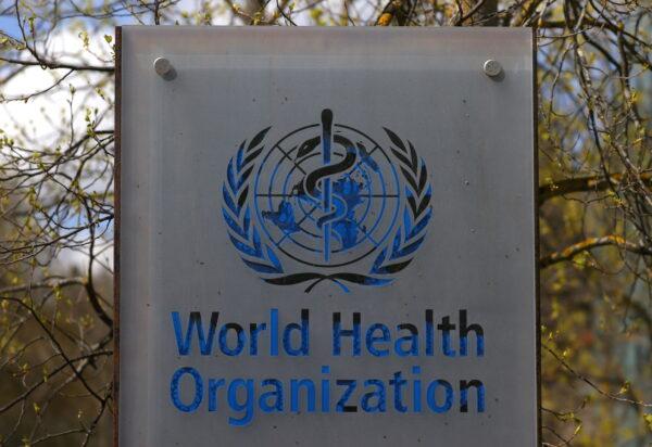 A logo is pictured outside a building of the World Health Organization (WHO) during an executive board meeting on update on the coronavirus disease (COVID-19) outbreak, in Geneva, Switzerland, April 6, 2021. (REUTERS/Denis Balibouse/File Photo)