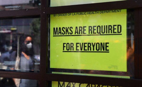 A sign reminds people masks are for everyone in Los Angeles, Calif. on July 19, 2021. (Frederic J.Brown/AFP via Getty Images)