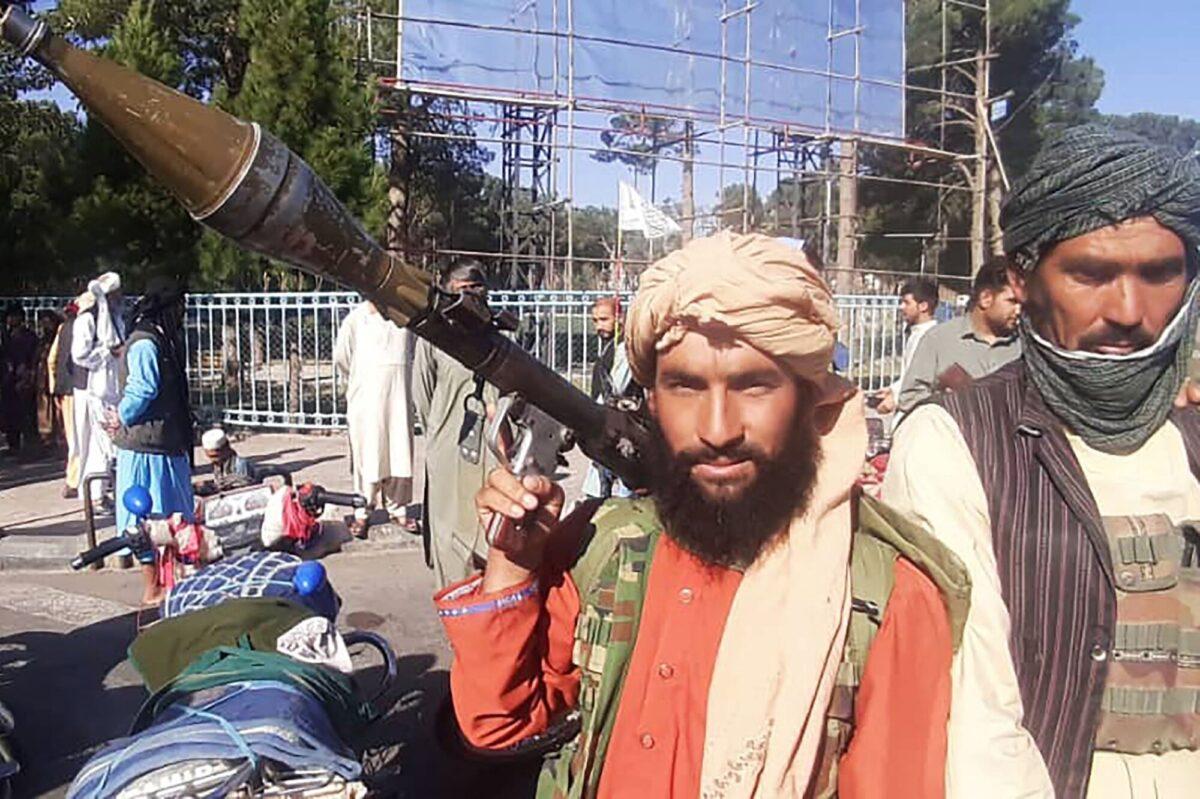 A Taliban terrorist holds a rocket-propelled grenade (RPG) along the roadside in Herat, Afghanistan, on Aug. 13, 2021. (AFP via Getty Images)