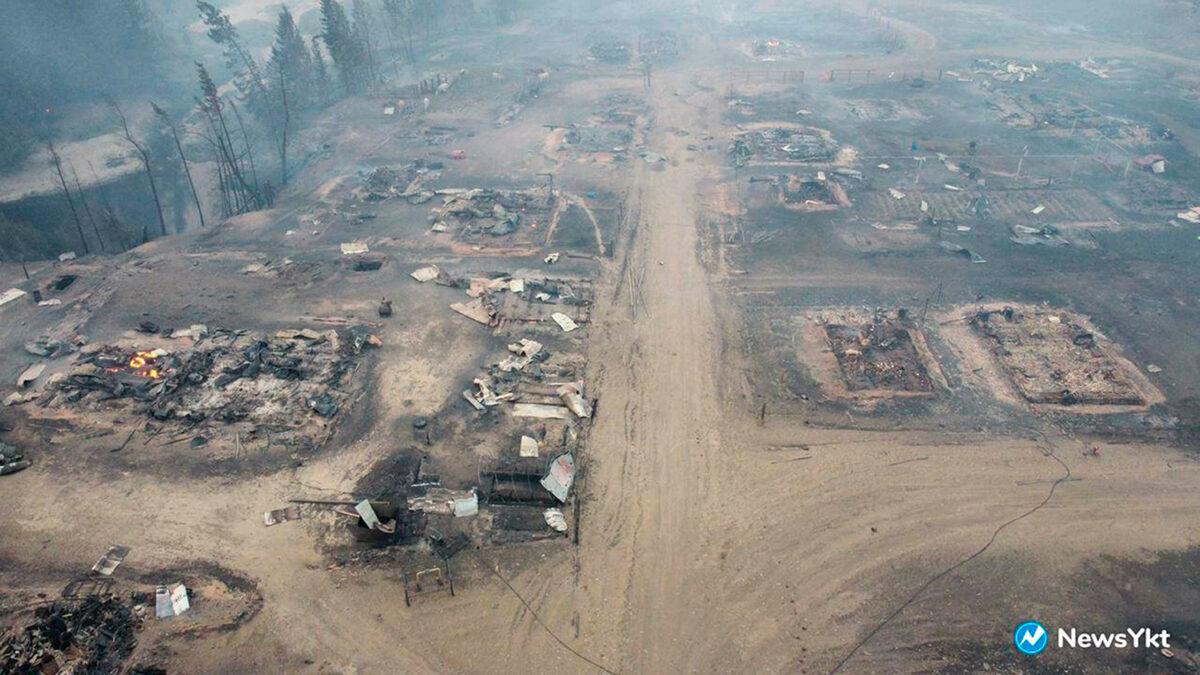 An airview of the Byas-Kuel village after a wild fire, in Russia Far East, on Aug. 8, 2021. (NewsYkt via AP)