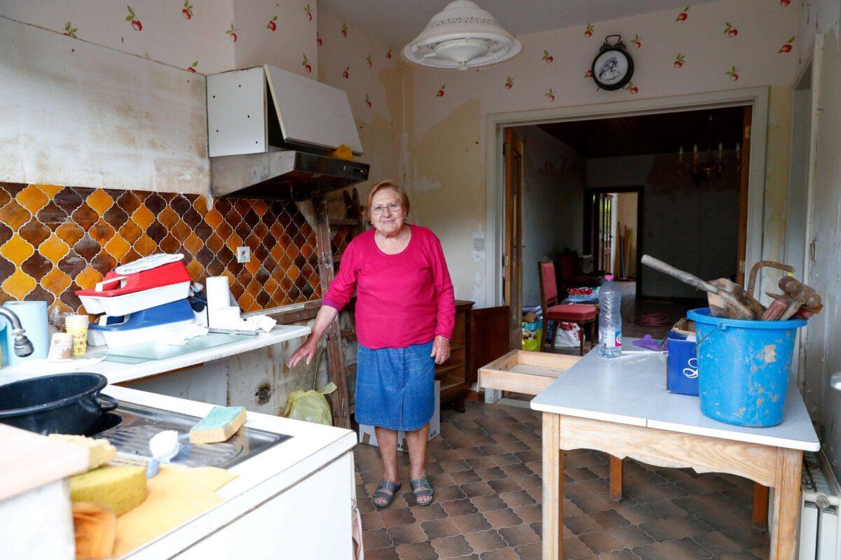 Helena, a resident of la Broeck, shows her home after heavy rainfall, in Belgium, on Aug. 9, 2021. (Johanna Geron/Reuters)