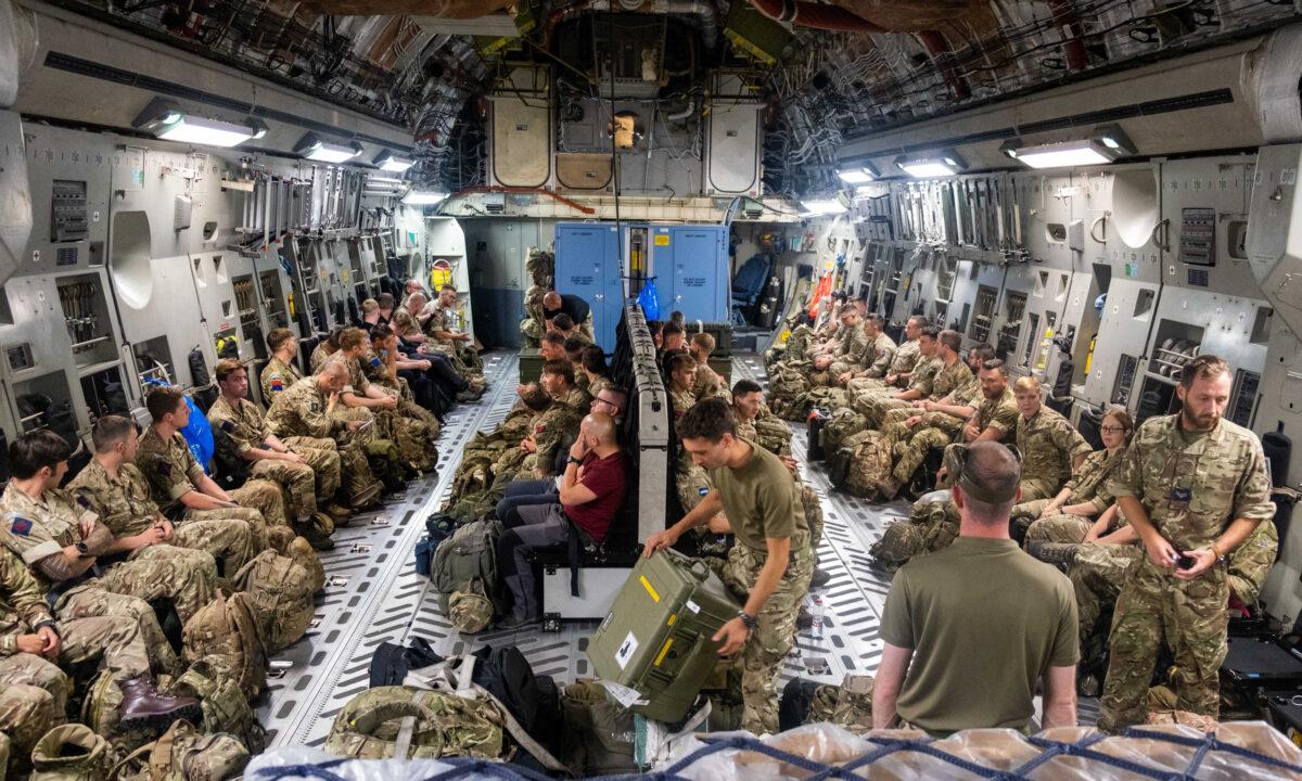Members of Joint Forces Headquarters deploying to Afghanistan to assist in the draw down of troops from the area on Aug. 13, 2021. (LPhot Ben Shread/Ministry of Defence/Crown Copyright via PA)