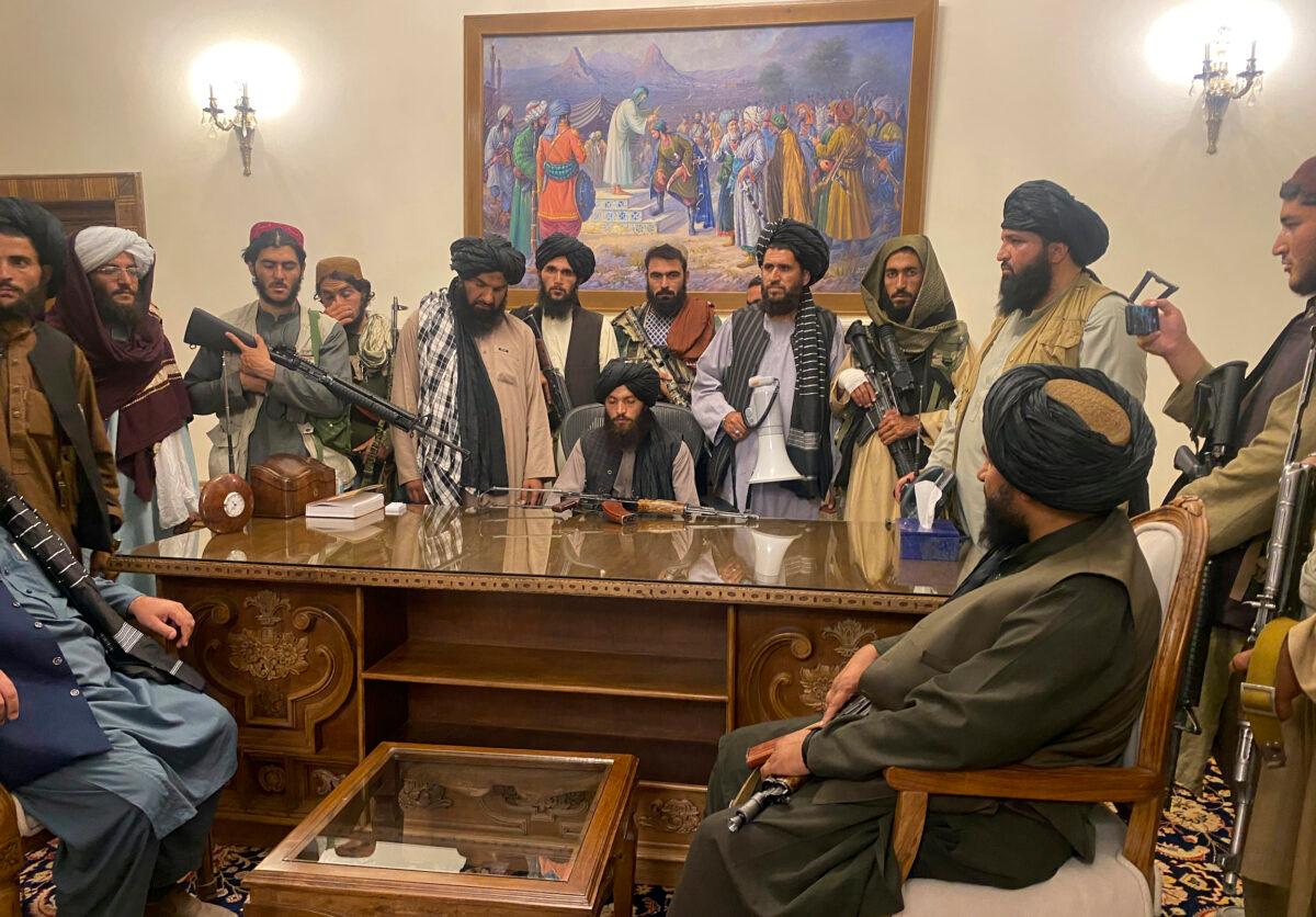 Taliban terrorists take control of Afghan's presidential palace after President Ashraf Ghani fled the country, in Kabul, Afghanistan, on Aug. 15, 2021. (Zabi Karimi/AP Photo)
