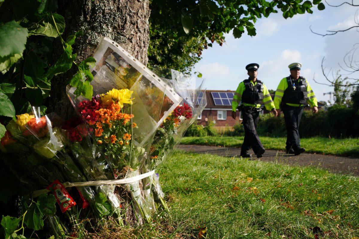 Floral tributes left in Keysham in Plymouth, Devon, for Stephen Washington, after five people were killed by gunman Jake Davison, in Plymouth, United Kingdom, on Aug. 16, 2021. (Ben Birchall/PA)