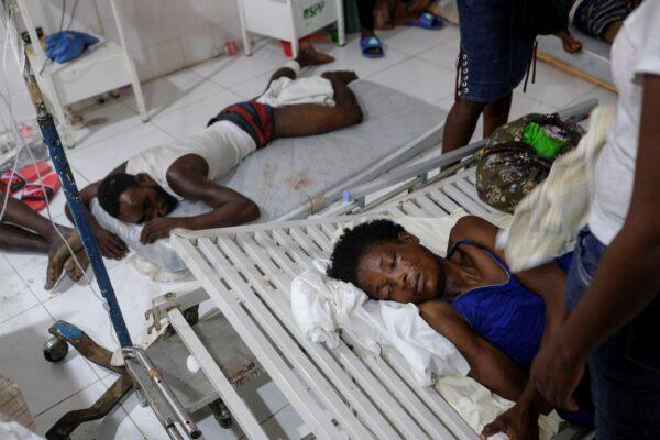 Injured people lie in the Immaculée Conception hospital in Les Cayes, Haiti, on Aug. 16, 2021. (Matias Delacroix/AP Photo)