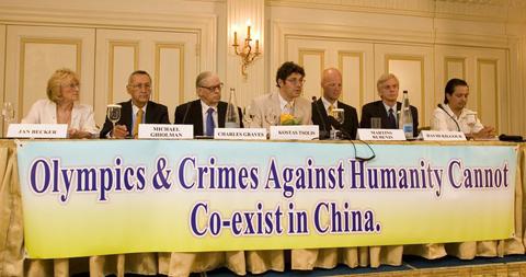 Jan Becker (L) partaking in a press conference about human rights violations by the CCP in the lead-up to the 2008 Beijing Olympic Games; in Athens, Greece, on Aug. 9, 2007. (Jan Jekielek/The Epoch Times)