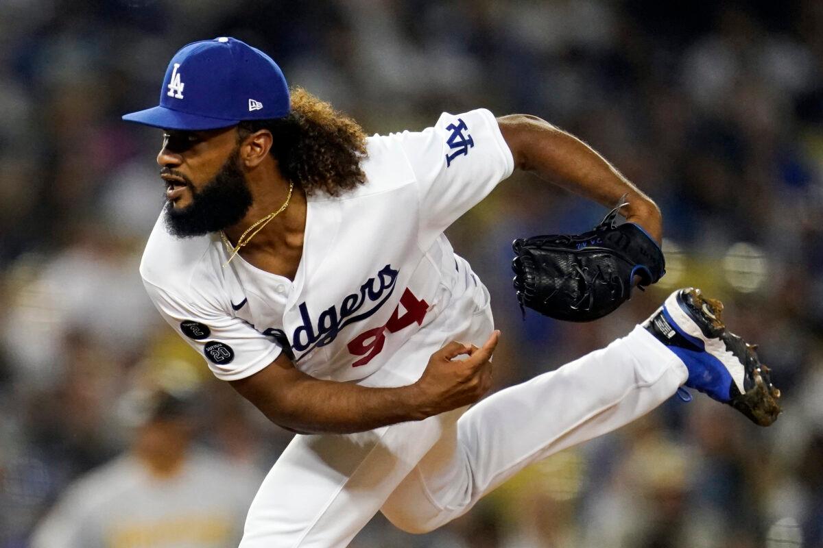Los Angeles Dodgers relief pitcher Andre Jackson throws to the Pittsburgh Pirates during the fifth inning of a baseball game in Los Angeles on Aug. 16, 2021. (AP Photo/Marcio Jose Sanchez)
